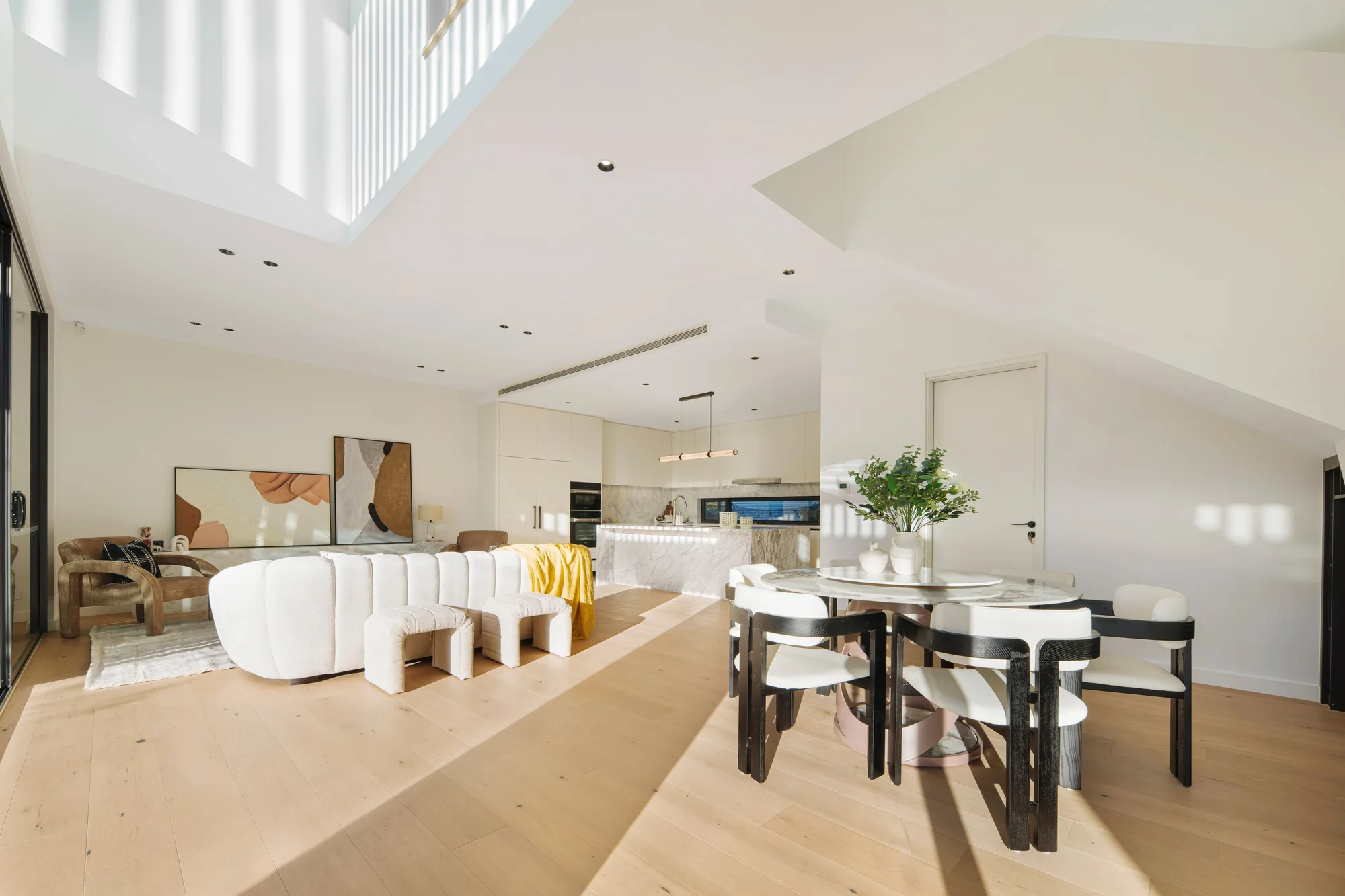 Open-plan living and dining in a completed Gladesville home